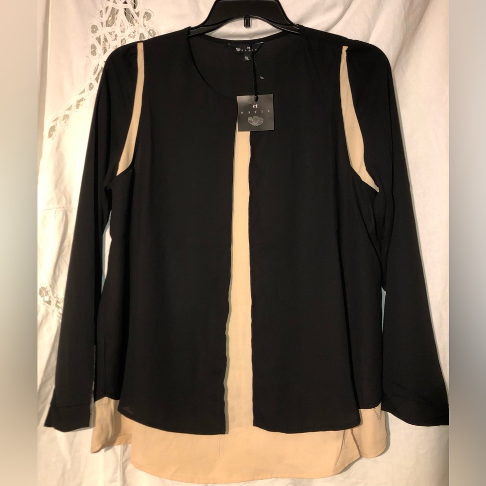 Elegant Black and Cream Long-Sleeve Blouse